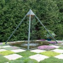 Keith’s dramatic pyramid fountain is surrounded by a giant checkerboard that alternates various mosses and thymes with botanical-pressed cement squares. Photo by Pete Paterson.