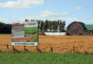 Signs like this one erected by the North Dufferin Agricultural and Community Task Force are starting to pop up around the countryside as NDACT focuses its opposition to the quarry around the protection of cropland. Photo by Bryan Davies