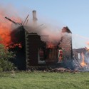 It took only minutes for fire to destroy this farmhouse on Hwy. 24, north of Horning’s Mills, as documented by photographer Harold Whyte.