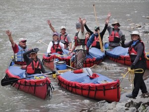 CanoeNorth55 The group cheers after running the formidable Cache Creek Canyon, Mountain River.