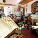 Real estate agent David Maguire now occupies one of them, which is large enough to accommodate his considerable collections of toys, books, pinball machines and other memorabilia. Photo by Rosemary Hasner.