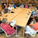 The seniors’ book club discusses a novel in Caledon East. Photo by Pete Paterson.