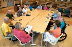 The seniors’ book club discusses a novel in Caledon East. Photo by Pete Paterson.