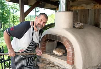Baker Matthew Woodley built his wood-fired oven himself from a kit.