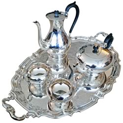 This silver tea set and full eight-service setting of Franciscan Desert Rose china, with accessory items, were donated to the silent auction portion of the Bethell garage sale by Ralph Van Dusen in memory of his wife Mary.