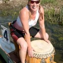 Team member Anne Cooper-Worsnop at the drummer’s post in the bow of the boat. Photo by Pete Paterson.