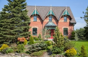 From the outside this Mono house is a classic replica of the Ontario Gothic Revival style at its finest, complete with elaborate gingerbread and elegant finials on its triple gables, and polychromatic brickwork.