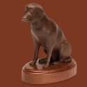 Jake (a chocolate lab), basswood, 6 ½" (excluding base). Photo by Pete Paterson.