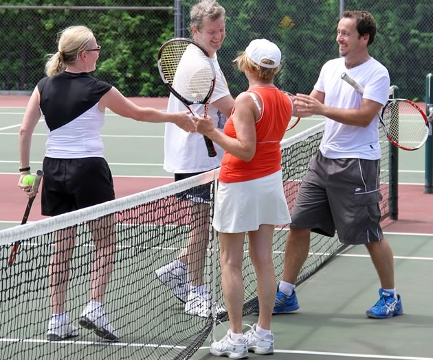 Andrea and Dave Adsetts (left) congratulate Carol Hall and Dennis Beentjes at a recent 95+ tournament on Mono Centre courts. Photo by Jason Hall.