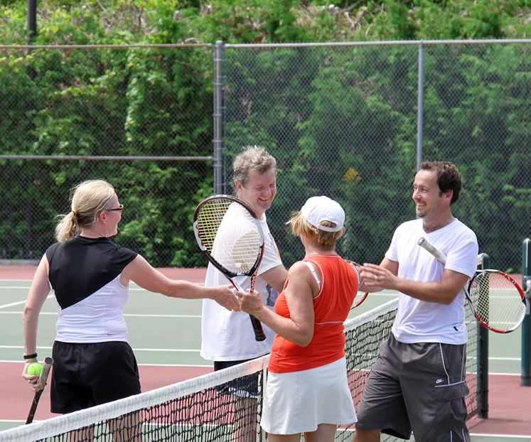 Andrea and Dave Adsetts (left) congratulate Carol Hall and Dennis Beentjes at a recent 95+ tournament on Mono Centre courts. Photo by Jason Hall.