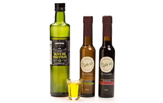 Up your salad game with a selection of olive oils and vinegars from local purveyors. Photo by Pete Paterson.