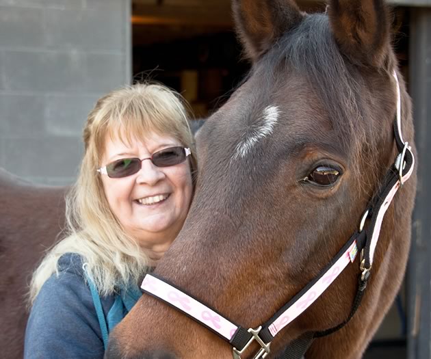 Debra Moore, cancer warrior on horseback. Photo by Pete Paterson.