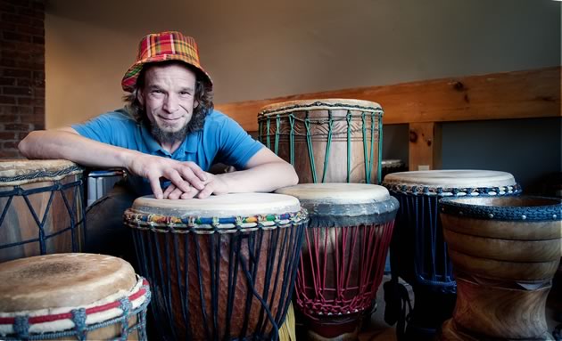 Drum-maker Jamie Andrews invites customers to try out various drums at his workshop because it’s important the character of the drum suits the drummer. Photo by Rosemary Hasner / Black Dog Creative Arts.