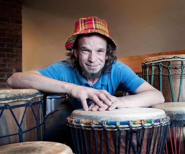 Drum-maker Jamie Andrews invites customers to try out various drums at his workshop because it’s important the character of the drum suits the drummer. Photo by Rosemary Hasner / Black Dog Creative Arts.