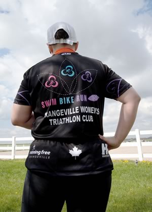 Members of the Orangeville Women’s Triathlon Club know a thing or two about team spirit. Training and socializing together has given them the confidence and support they need to swim, bike and run their way to successful Iron Girl competition. Photo by Rosemary Hasner / Black Dog Creative Arts.