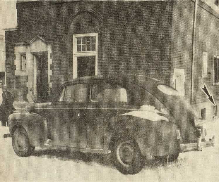The safecrackers’ car abandoned in front of the Imperial Bank in Bolton.
