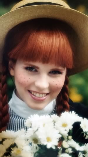 A promotion photo of young Leisa as Anne of Green Gables. Among the many places it has appeared are tourism posters, encyclopedias, bottled water, seed packets and cutlery. Photo by Gordon Johnston.