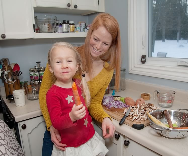 Sharah Mooy and her daughter Elia, 3, prep a plant-based dinner at their home in East Garafraxa. Sharah, who is studying to become a holistic nutritionist, shares vegan recipes and restaurant tips on her Instagram feed. Photo by Rosemary Hasner / Black Dog Creative Arts.