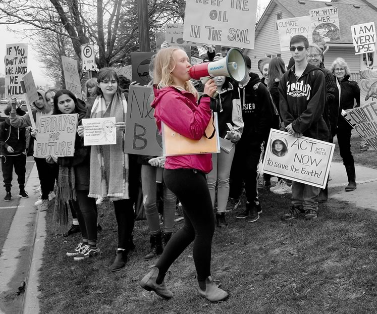 Inspired by young Swedish activist Greta Thunberg, Orangeville student Olivia Rowan urged on fellow protesters at a recent local climate strike. Photo by Rosemary Hasner / Black Dog Creative Arts.