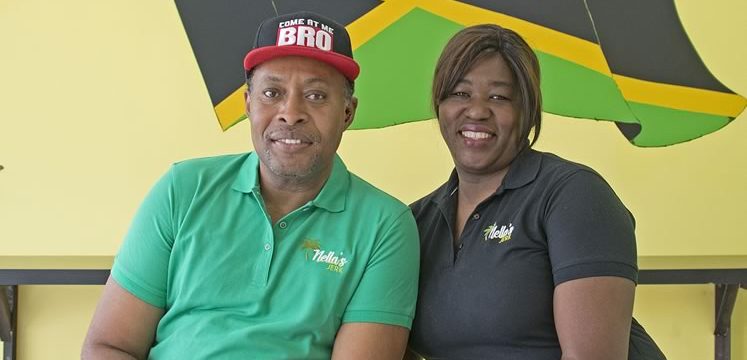 Arnella Levy and her husband, Nigel Spencer, at Nella’s Jerk. Photo by Pete Paterson.