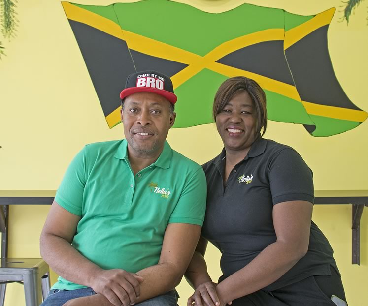 Arnella Levy and her husband, Nigel Spencer, at Nella’s Jerk. Photo by Pete Paterson.