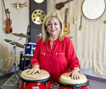 Mary Balinov makes music with heart at Tisho’s Music Academy in Bolton. Photo by Pete Paterson.