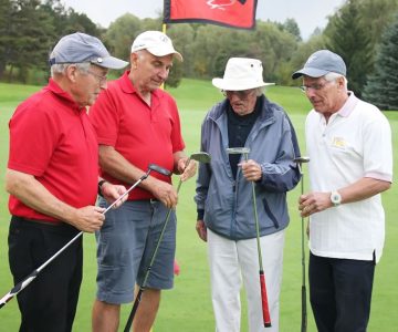 Bob Pillar (left), shown here with John Jelaca, Tony Oliver and Randy Freitag, organizes regular senior men’s golf days. Photo by Enzo Villa.
