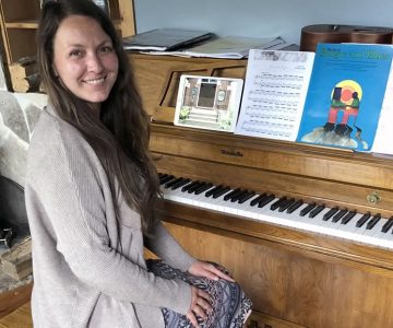 Grand Valley’s Karla Leger teaches her piano students via video chats.