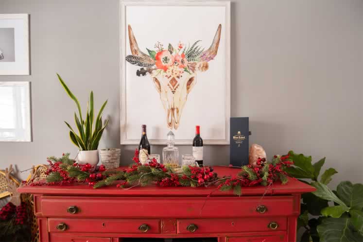 Jacelyn’s most treasured piece is this vintage red sideboard. Photo by Erin Fitzgibbon.