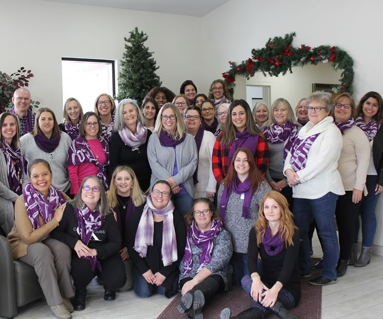 Staff and volunteers at Family Transition Place last year, from left to right, back row: Sara Smith, Janice Snow, Janet Taylor, Lynette Pole-Langdon; third row: Travis Greenley, Ashlynne Cameron, Kendra Wassink, Joanne Jordan, Samantha McCabe, Sara Flache, Debbie Cribbis, Diane Vandenberg, Trish Grabb; second row: Femi Oke (on arm of chair), Lyn Allen, Kristy Fearon, Lisa Goodison, Norah Kennedy, Janice Glassford, Andrea Chantree, Laura Moscatiello, Debbie Lahey, Bonnie Waterfield, Donna Buchan, Stephanie Figliomeni; front row: Christina Gonzalez (seated), Kelly Bohonos, Julie Newton, Tiffany McMillan, Courtney Halkett, Cheryl Martin-Goncalves and Keely Horan. Photo by Kelly Lee.