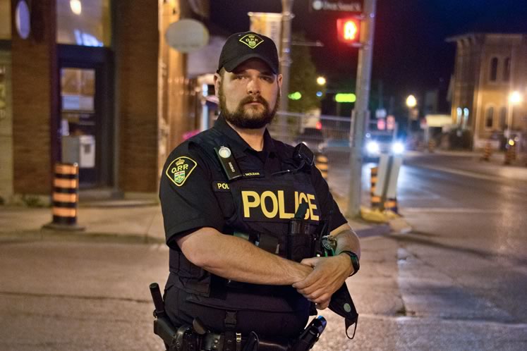 Dufferin OPP Constable Jeff McLean on patrol during a routine overnight assignment. Photo by Pete Paterson.