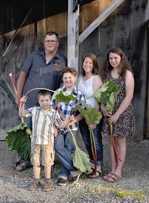 The French family: Brian and Jeannette with their children Emmett (left), Charlie and Kayleigh. Photo by Kidlets Photography.