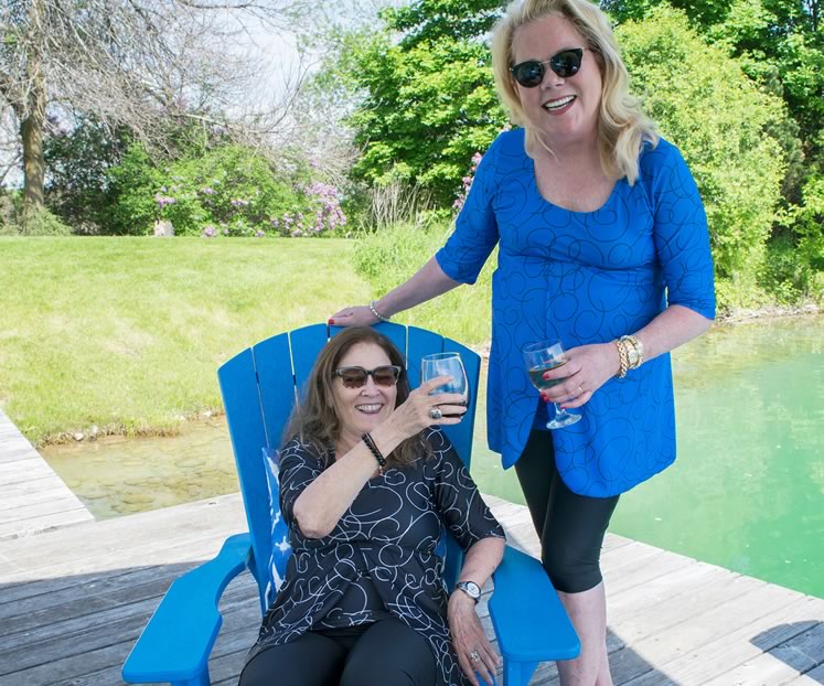 Velvet Haney (left) and Rachel Manley show off the swimwear they designed for women “who aren’t at Woodstock anymore.” Photo by Garland Haney.