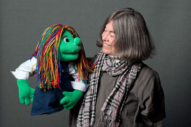 Puppet maker Jane Ohland Cameron and one of her fuzzy friends. Photo by Pete Paterson.