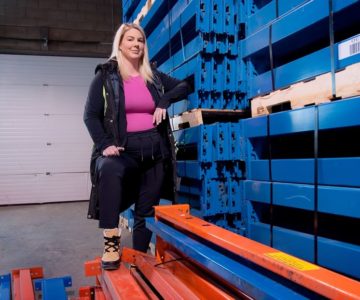 Grand Valley’s Jenna Brooks stands amid the storage racks her Mississauga-based company, Racked Out Inc., installs for clients. Photo by Rosemary Hasner / Black Dog Creative Arts.