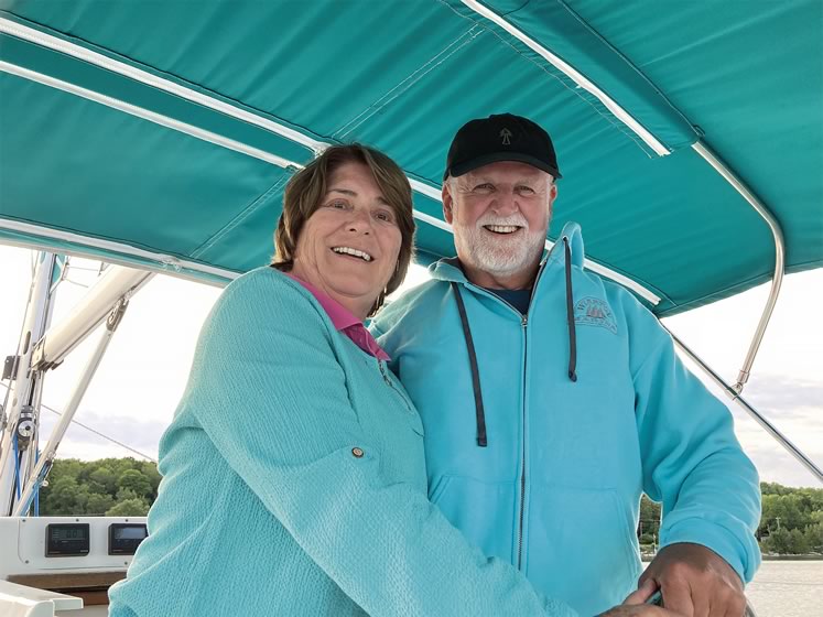 In 2021, Kathy Anderson and Michael Coombs, who met through an online dating site, celebrated their eighth wedding anniversary on their sailboat Escape. Photo Courtesy Kathy Anderson.