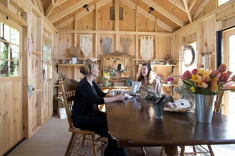 Constructed in 2021, a pine shed by Jay’s Custom Sheds serves as the three-season headquarters for mother-daughter duo Carolyn Young and Erica Storey and their new Caledon business, YS Florals. Photo by Pete Paterson.